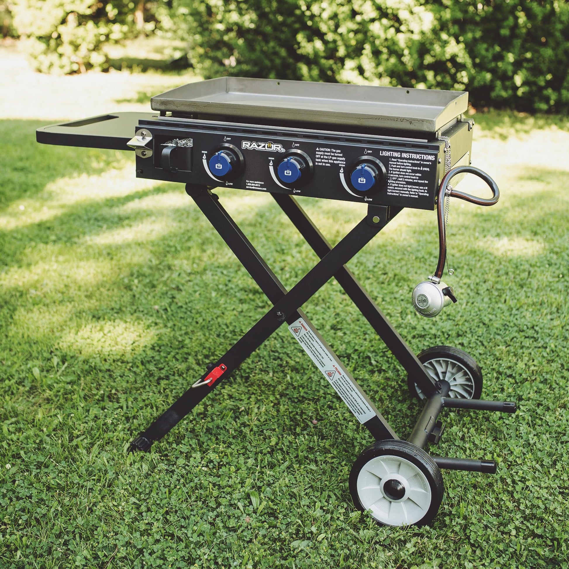 Razor Griddle Gas Grill & Griddle for Backyard Cooking and Camping, Portable Grill with Cart & Side Shelf ANM Liquidation